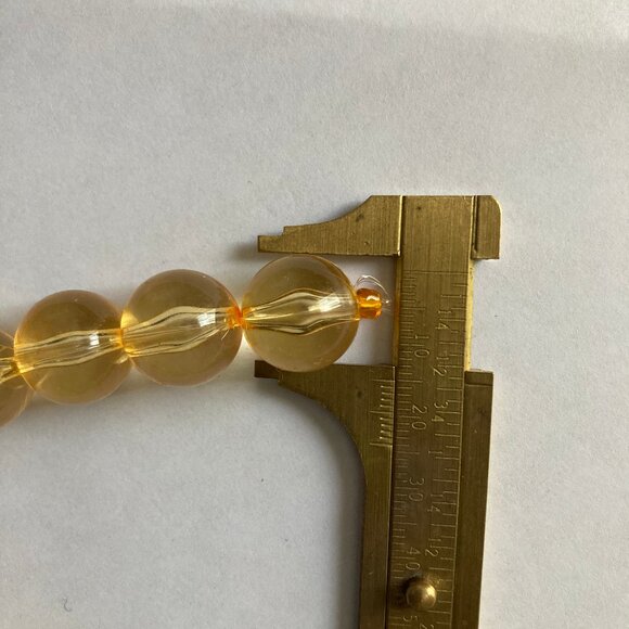 NWT 2 Strands of Transparent Amber-colored large round beads - Picture 3 of 5